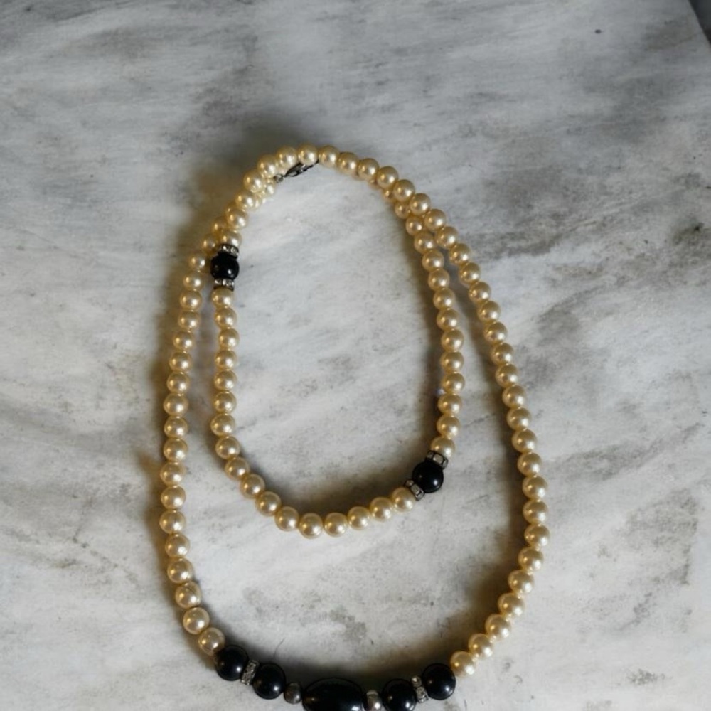 Simulated Pearl Necklace with Onyx Beads 31” long
15 1/2 folded length wise